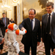 Illustration for article titled Politicians Shaking Hands With Robots, Ranked